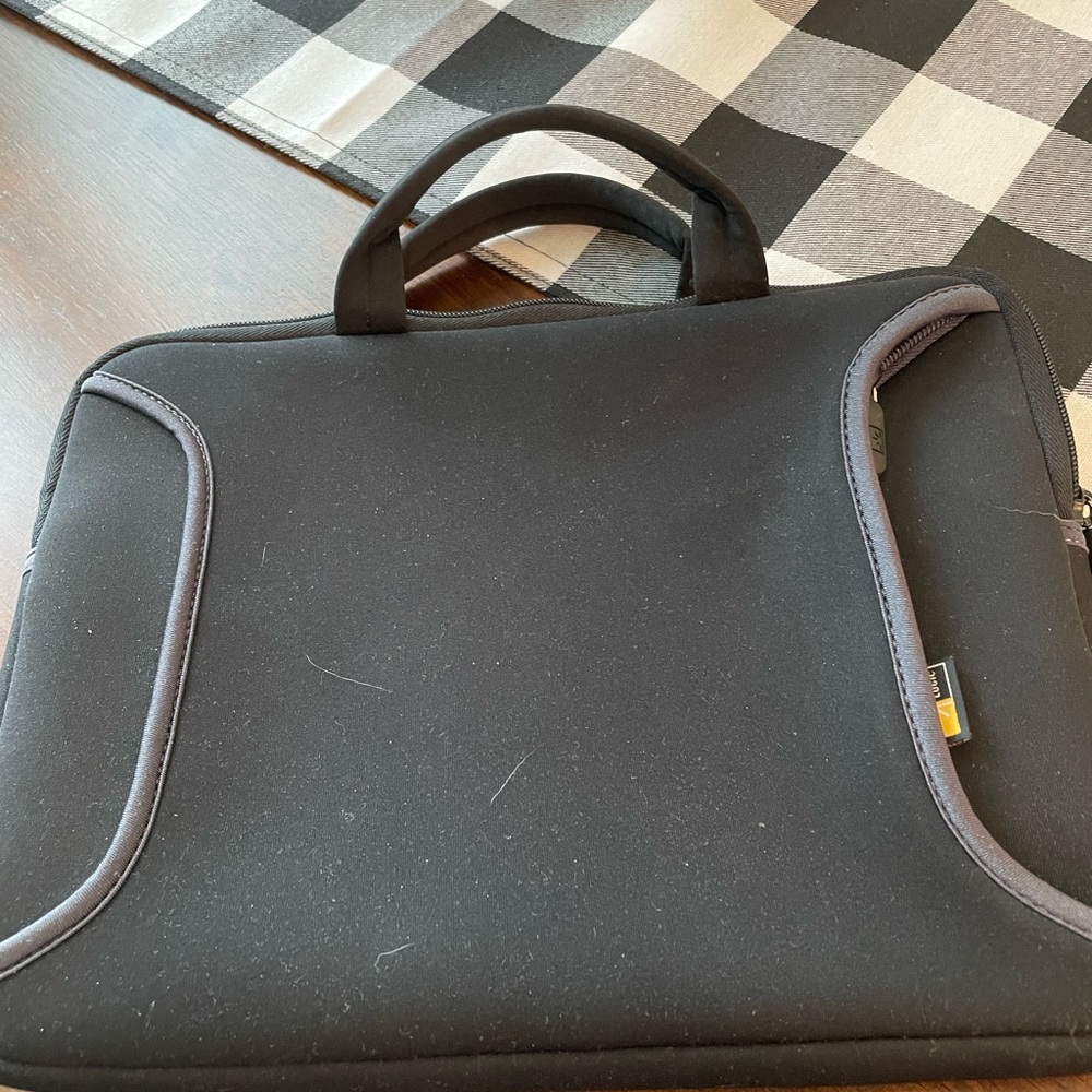 Black sleeve for iPad. Slightly used